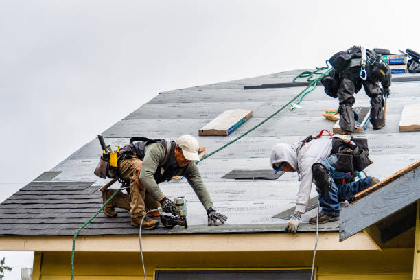 Professional Roofing technician working in East Fairfield, VT